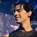 Joe Jonas shares a fun moment with an unknown woman at Bad Bunny’s exclusive party, one year after his divorce from Sophie Turner.